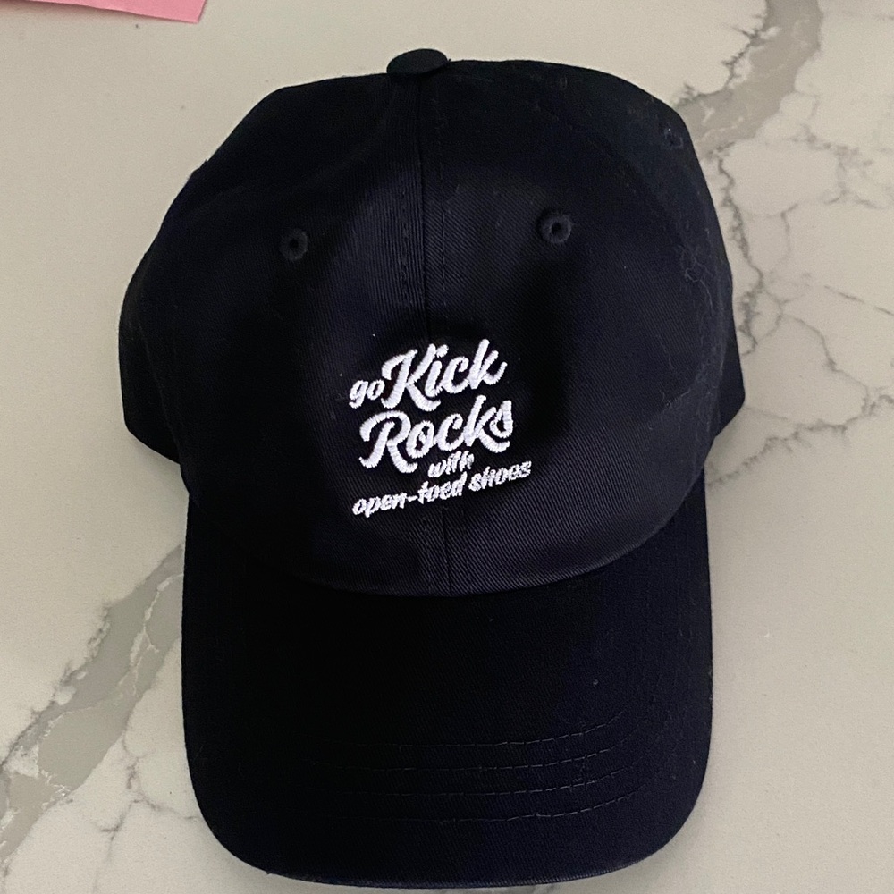 “Go Kick Rocks” black cap